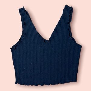 This is a dark blue Hollister crop top. Size S. This shirt is super cute.